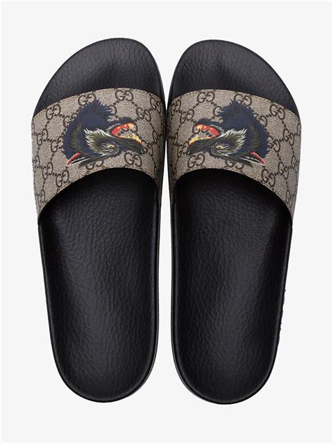 gucci gg supreme slides with wolf